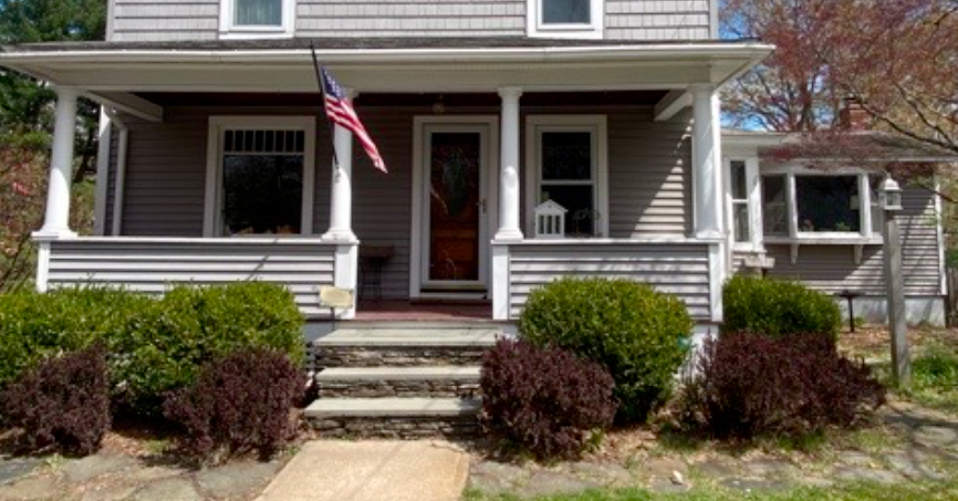 The front yard before removing shrubs.